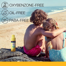 SPF 50 Beach Defense sunscreen spray bottle with Oxybenzone-free icons