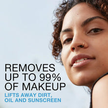 Makeup remover cleansing towelettes with model face, “removes up to 99%” text