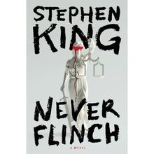 Hardcover novel front cover with skeleton figure, Stephen King text, and red accents