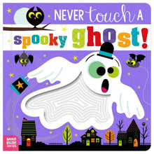 Board book cover with spooky ghost illustration, green eyes, and haunted houses
