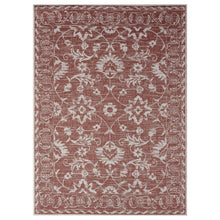 Patio area rug in terracotta and ivory with ornate botanical floral medallion pattern