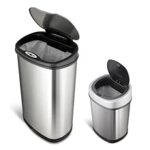Stainless steel sensor trash can with open lid and smaller matching bin