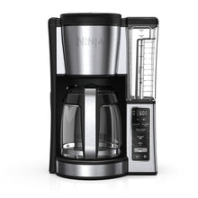 Black stainless steel 12-cup programmable coffee brewer with carafe and water reservoir