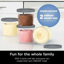 Ice cream maker with four pint containers, lids, and one open pint shown