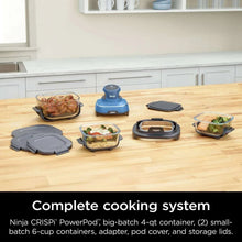 Portable air fryer system with several glass containers and snap-on lids on counter