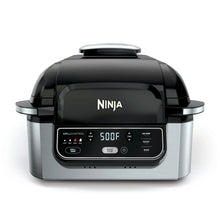 Black electric indoor grill with digital control panel and openable lid