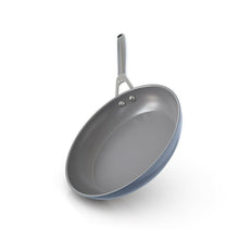 Blue ceramic non-stick fry pan with stainless handle and rivets