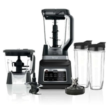 Kitchen blender and food processor set with black base, clear pitcher, and stacked blades