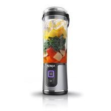 Cordless personal blender with stainless blades, clear 18 oz cup, dark base
