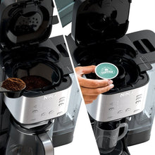 Ninja coffee maker with pod inserted, showing brew chambers and carafes