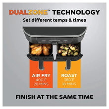 Dual-basket air fryer showing two cooking zones with separate baskets, black