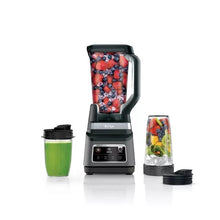 Smoothie blender with clear 72 oz pitcher and two single-serve cups, black base