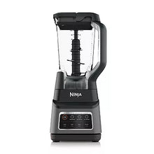 Black countertop blender with clear pitcher and control panel on the base