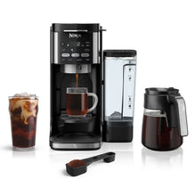 DualBrew single-serve and 12-cup drip coffee maker with black carafe and pod brewer