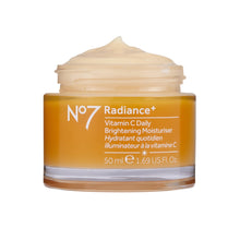 No7 Radiance+ Vitamin C daily brightening face moisturizer jar, amber with white lid
