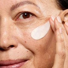 Face & neck moisturizer applied to skin under the eye and cheek