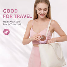 Pink electric razor with travel-lock switch, paired with a tote bag