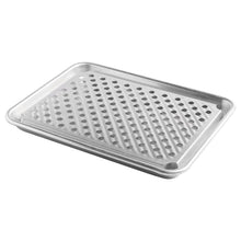Rectangular perforated grilling tray with raised edge and circular holes