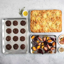3-piece baking sheet set with filled trays: cookies and roasted vegetables