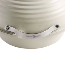Nordic Ware sourdough baking cloche handle with two metal clips and white lid