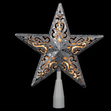 Glitter silver star Christmas tree topper with copper cutout swirls and white stem