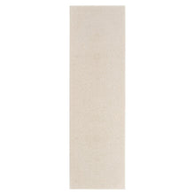 Beige rectangular area rug, simple textured surface