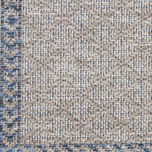 Textured gray rug with blue accent lines and speckled woven pattern