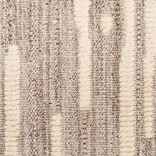 Runner rug close-up of looped texture with beige and gray vertical striped pattern