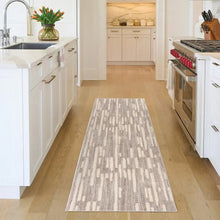 Runner rug with gray and light beige vertical abstract pattern, short pile texture