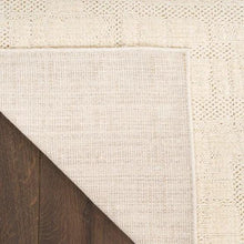 Cream runner rug border with tightly woven edge and textured corner detail