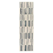 Rectangular cream runner rug with navy-blue striped blocks and staggered line details.
