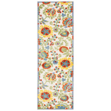 Indoor/outdoor area rug with ivory background and multicolor repeating floral motif