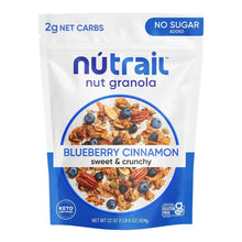 Blueberry cinnamon granola in blue-and-white stand-up pouch, labeled No Sugar Added.