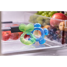 Three baby silicone teethers in green and blue, each with a circular ring hole