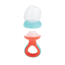 Nuby Nibbler soft foods feeder with white mesh top, red silicone handle and pink insert