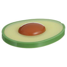 Avocado silicone teether top view with dark brown center set in light-green textured ring