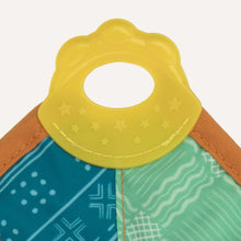 Yellow ring teether on blue-green teething blanket with stitched seams