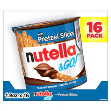 Hazelnut cocoa spread jar with pretzel sticks, blue and white front label