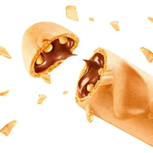 Crispy wafer roll filled with chocolate-hazelnut spread, broken ends