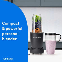 Personal blender with black base, blending jar, and filled blending cup