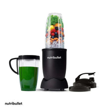 Personal blender with matte black base, blending jar, and cup with lid