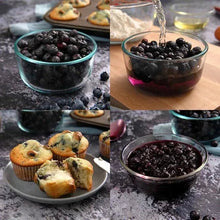 Glass bowls of freeze-dried blueberries with snack muffins and scattered berries