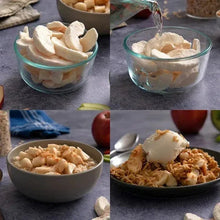 Glass bowls of white freeze-dried fruit pieces with granola in a bowl