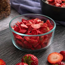 Glass bowl filled with freeze-dried strawberry slices
