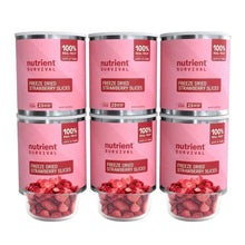 Freeze-dried strawberry slices in three pink-labeled canisters