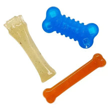 Three bone-shaped dog chew toys in beige, blue, and orange