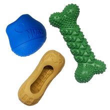 Three Nylabone NUBZ chew toys: blue drum stick, green bone, tan indented shell