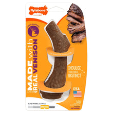 Medium antler-shaped dog chew toy with textured ridges, in retail package