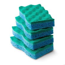 Stack of green-and-blue scrunge sponges with textured scrub tops