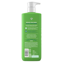 Green body wash bottle with white pump, back label and barcode visible